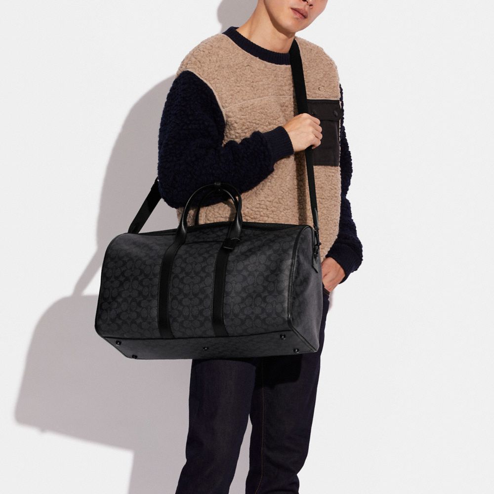 Men Coach Gotham In Signature Canvas Copper Duffle Bags Black | CA_CH96144