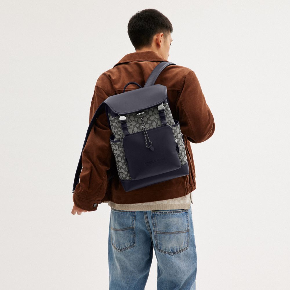 Men Coach League Flap In Signature Jacquard Backpacks Navy | CA_CH58011