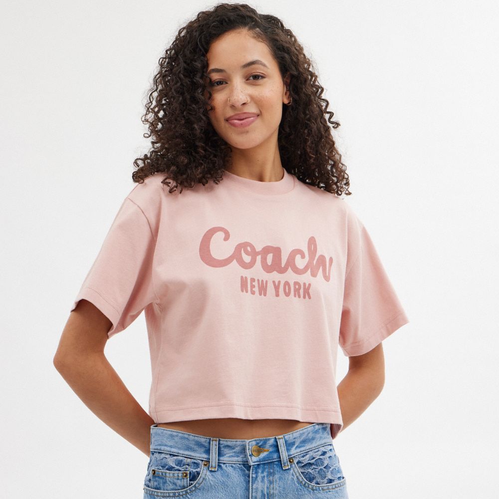 Women Coach Cursive Signature Cropped T Shirts Pink | CA_CH67153