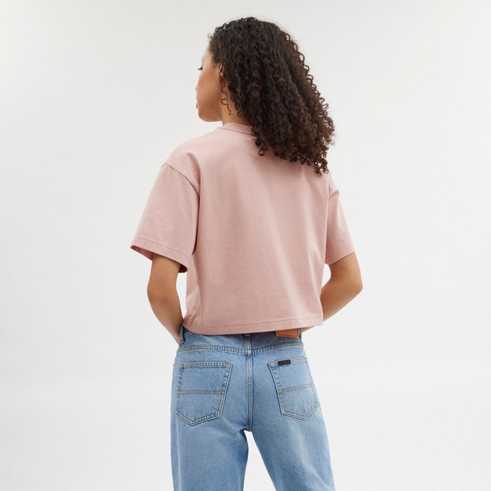 Women Coach Cursive Signature Cropped T Shirts Pink | CA_CH67153