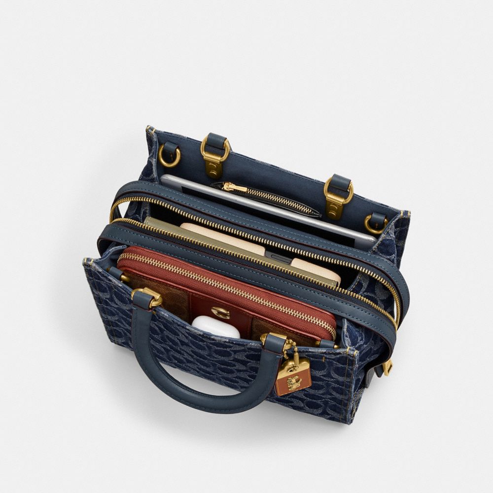 Women Coach Rogue 25 In Signature Denim Brass Handbag Blue | CA_CH79428