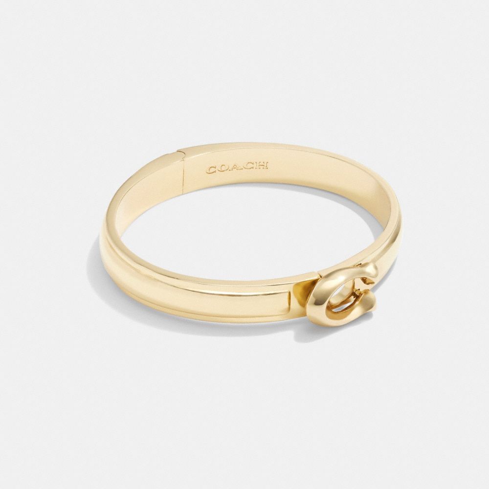 Women Coach Tabby Hinged Bangle Bangles Gold | CA_CH68173